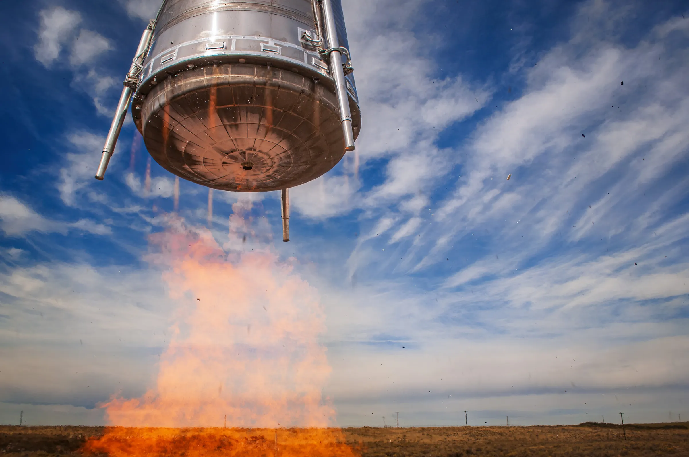 Stoke Space Hopper test vehicle lifting off under its own engine plume